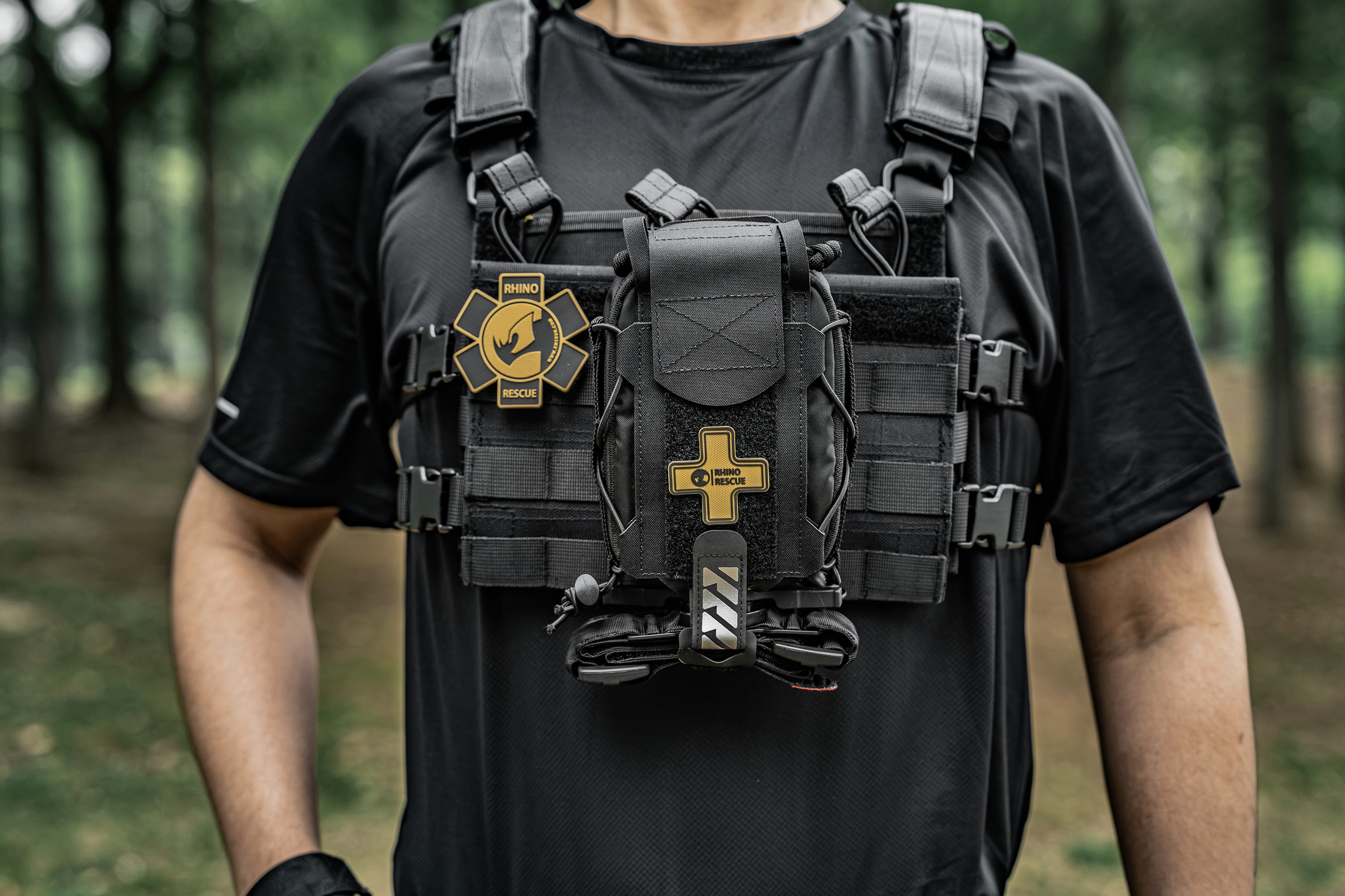 tactical kit mounted on a plate carrier vest
