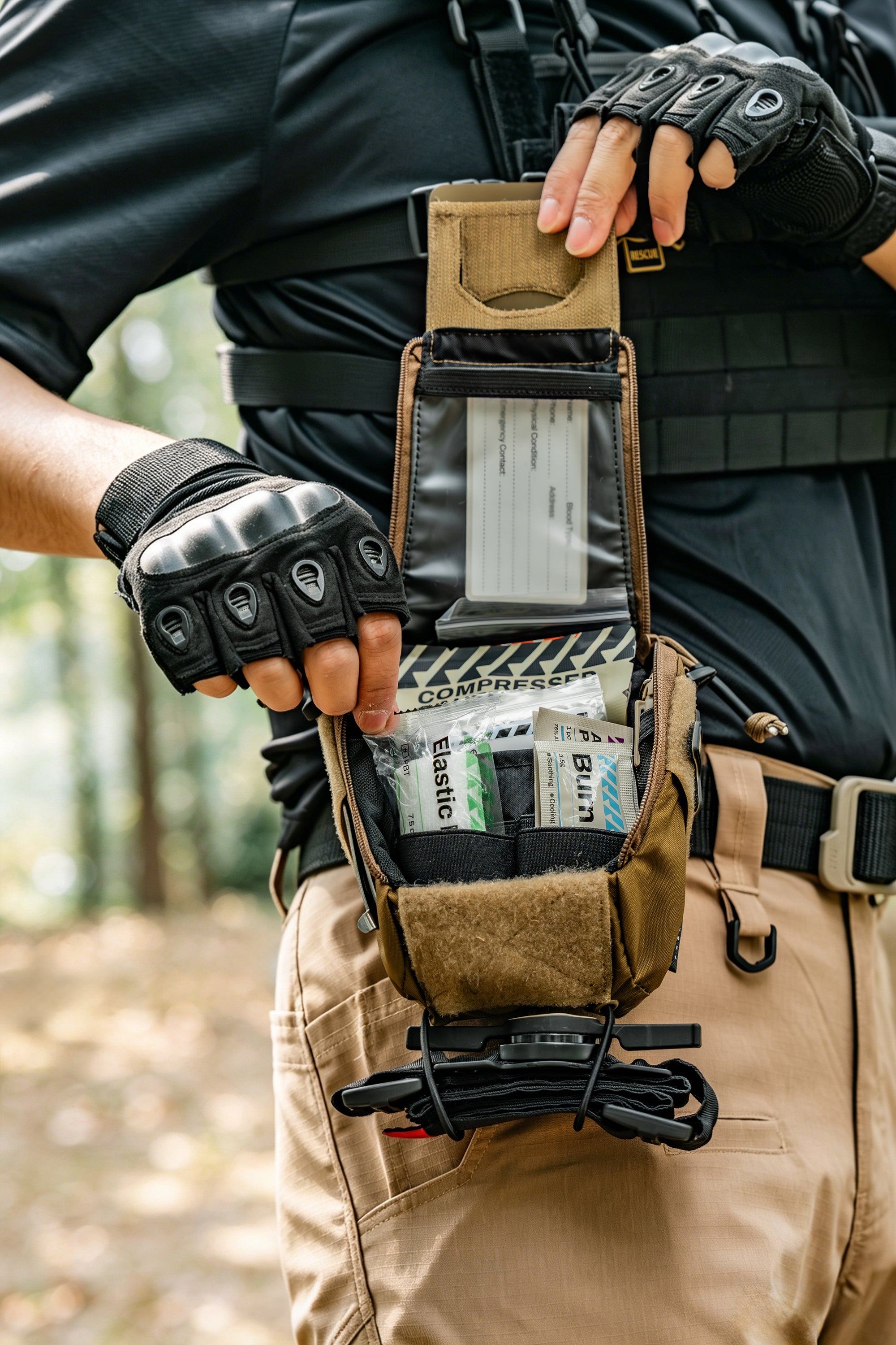 open a Rhino Rescue molle outdoor first aid kit to show its supplies